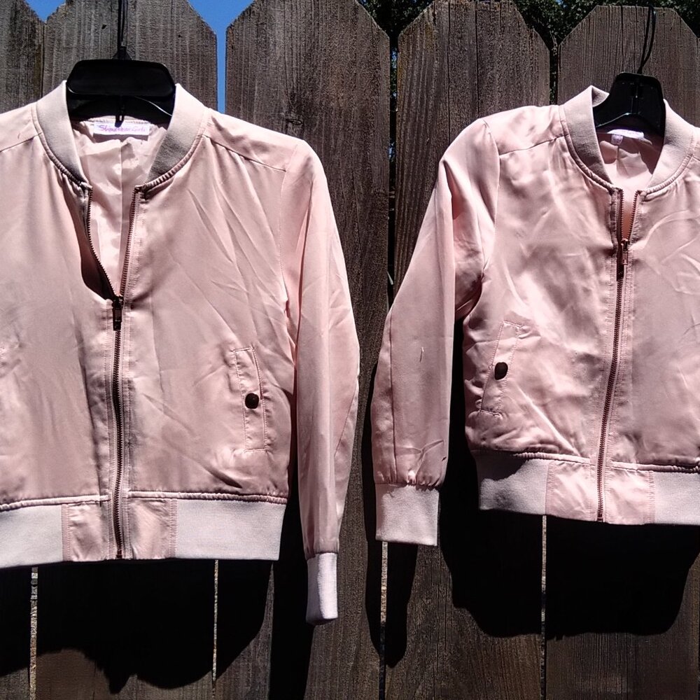 Girls matching pink jackets